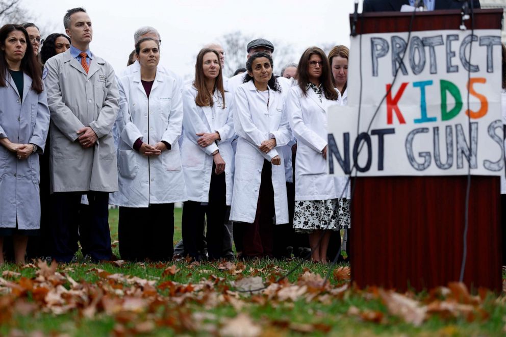 PHOTO: Medical professionals listen as Dr. Roy Guerrero, a physician from Uvalde, Texas, speaks at a press conference on gun control on Capitol Hill, Dec. 7, 2022 in Washington, D.C.