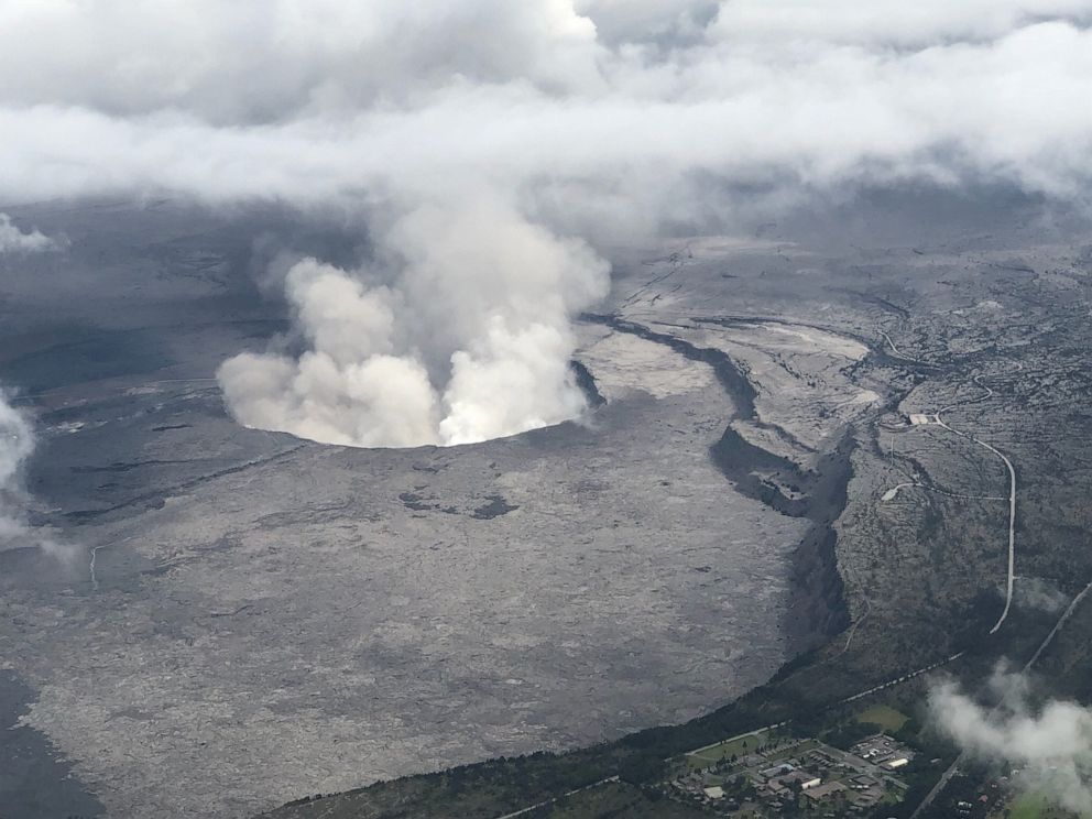 PHOTO: An aerial view of Kilauea Volcano's summit caldera and an ash plume billowing from Halema'uma'u, a crater within the caldera, in Hawaii, May 27, 2018.