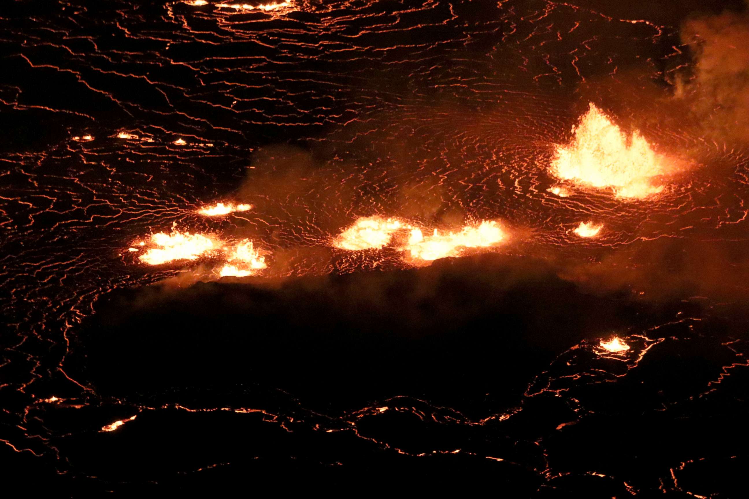 PHOTO: A rising lava lake is seen within Halema'uma'u crater during the eruption of Kilauea volcano in Hawaii National Park, Sept. 29, 2021.