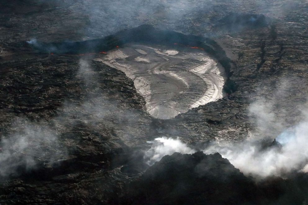 PHOTO: A handout photo made available by the US Geological Survey shows a telephoto view of the lava lake within Halema'uma'u crater taken from the west rim and looking east in the morning, at Mount Kilauea on Hawaii, Nov. 23, 2022.