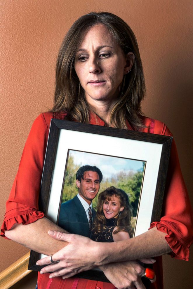 PHOTO: In this May, 15, 2014, file photo, Kim Goldman holds a photo of her with her late brother, Ron Goldman, killed along with his friend Nicole Brown Simpson in 1994, during an interview at her home in Santa Clarita, Calif.
