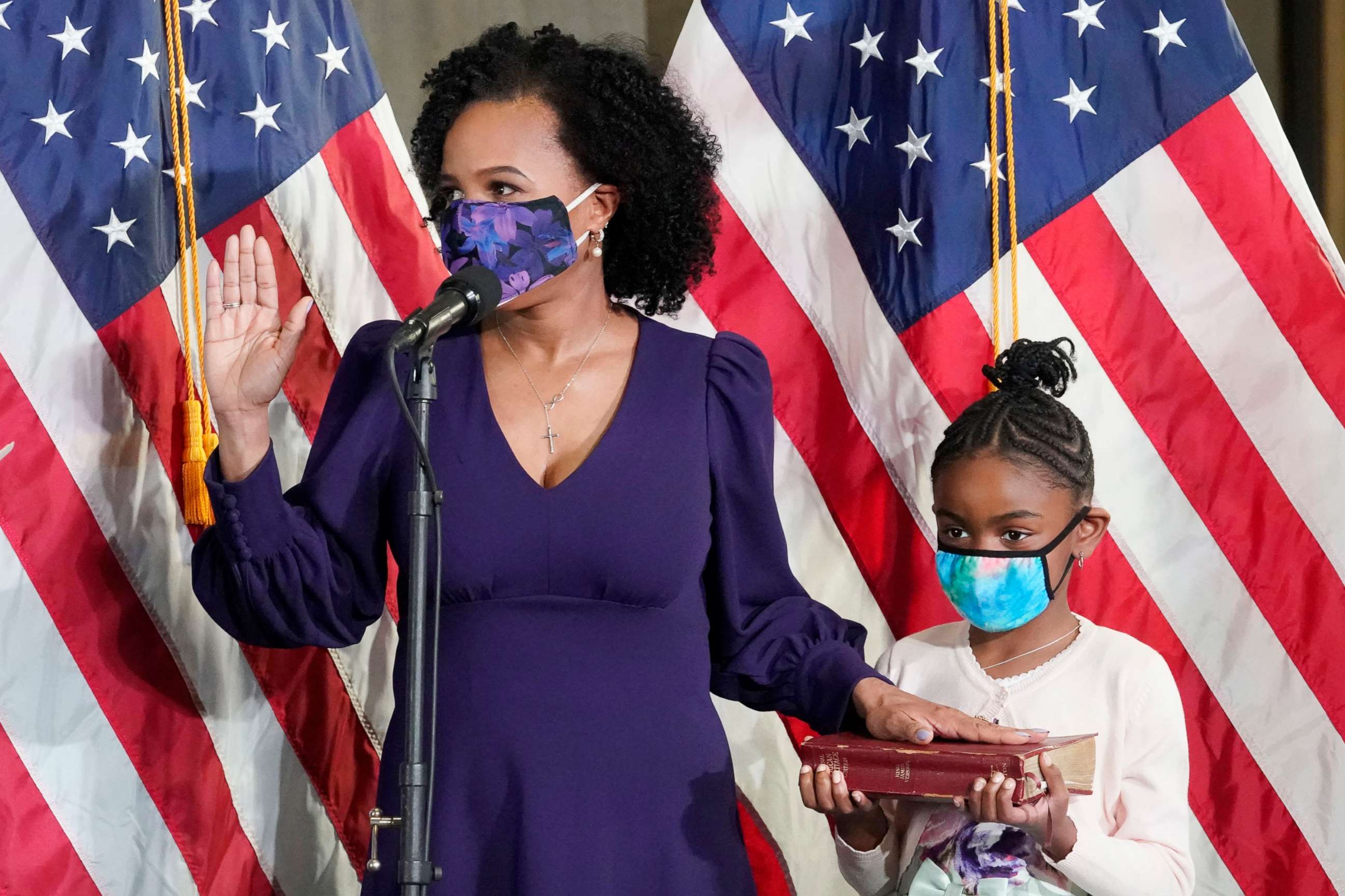 PHOTO: Former Boston City Council President Kim Janey, 55, is sworn in as Boston's new mayor at City Hall while her granddaughter, Rosie, holds a Bible, March 24, 2021, in Boston.