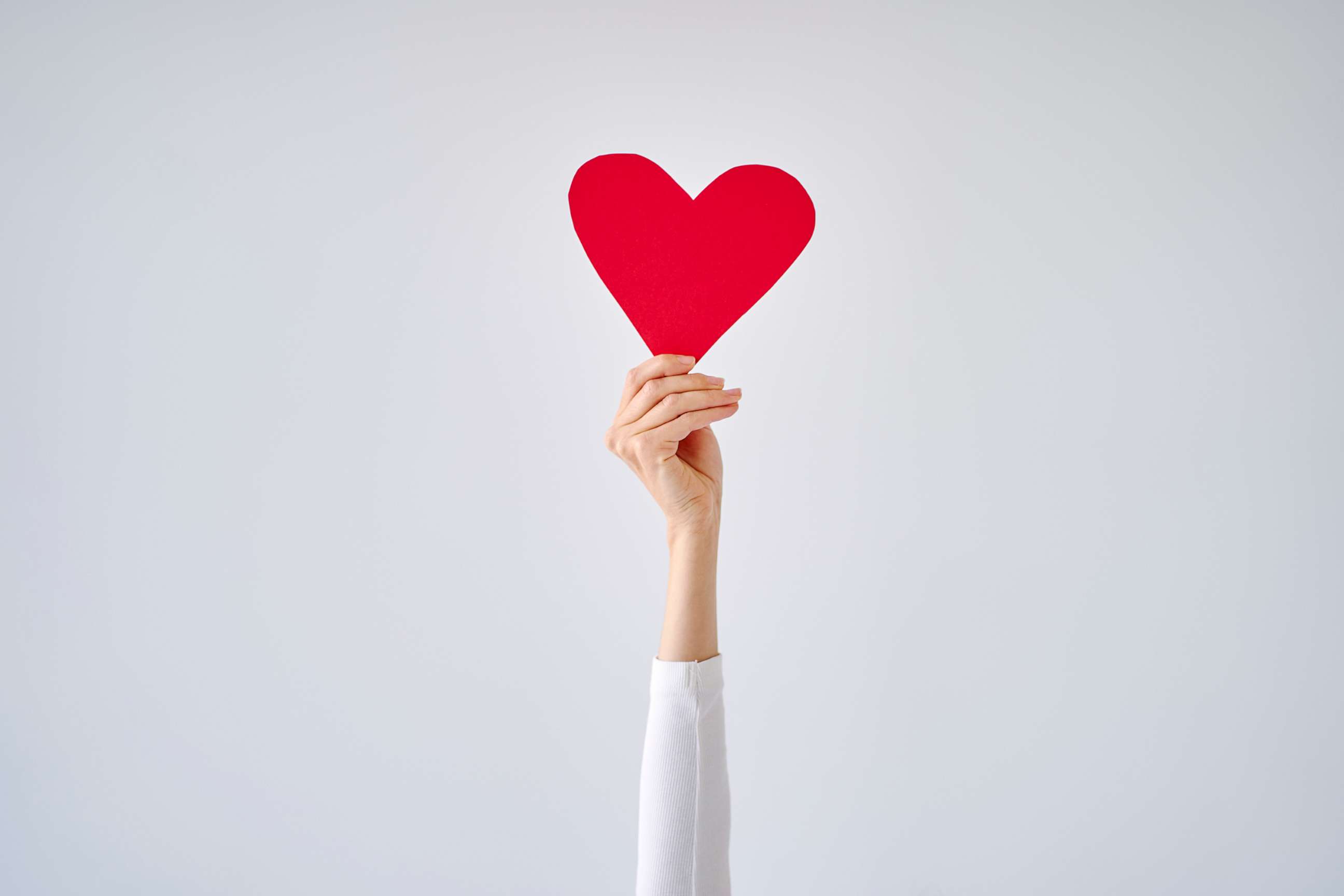 PHOTO: A stock photo of a person holding a heart.