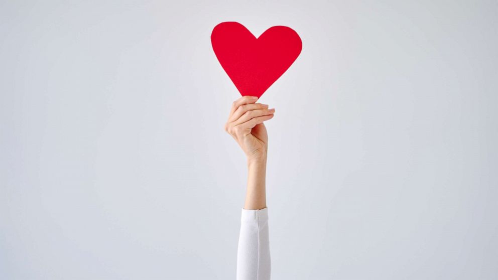 PHOTO: A stock photo of a person holding a heart.