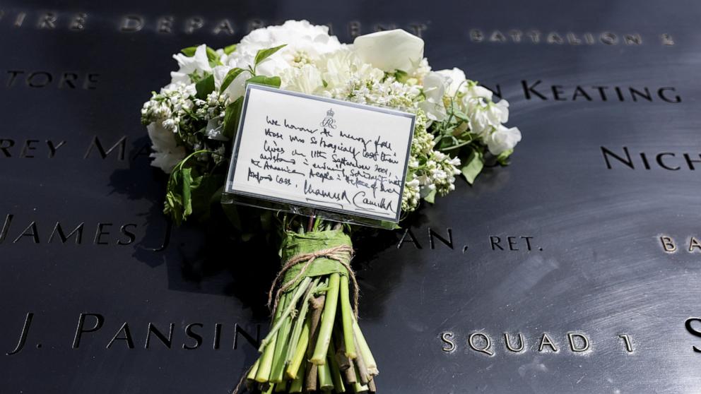 PHOTO: A bouquet of flowers with a note from Britain's King Charles and Queen Camilla lies at the 9/11 Memorial, during their state visit to the United States, in New York City, April 29, 2026. 