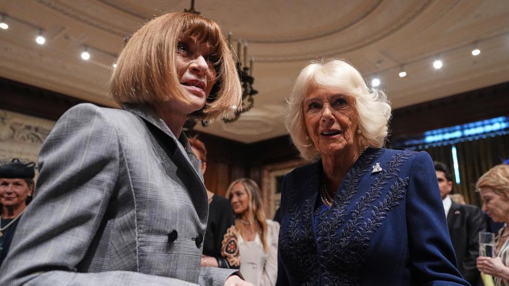PHOTO: Queen Camilla greets Global Editorial Director of Vogue Anna Wintour during a visit to the New York Public Library for a literacy event, April 29, 2026, in New York City. 