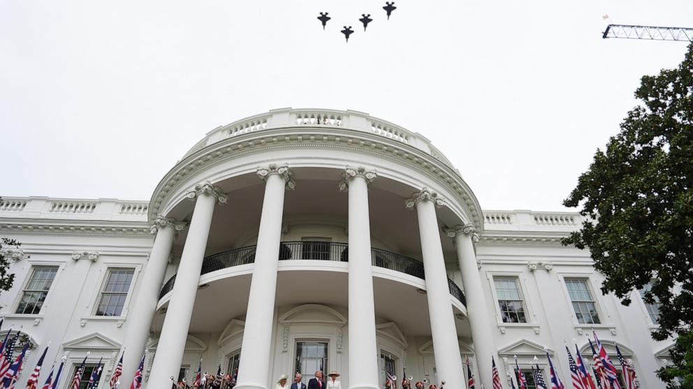 PHOTO: Queen Camilla, King Charles III, President Donald Trump and first lady Melania Trump watch a fly over during an arrival ceremony on the South Lawn of the White House, April 28, 2026, in Washington. 