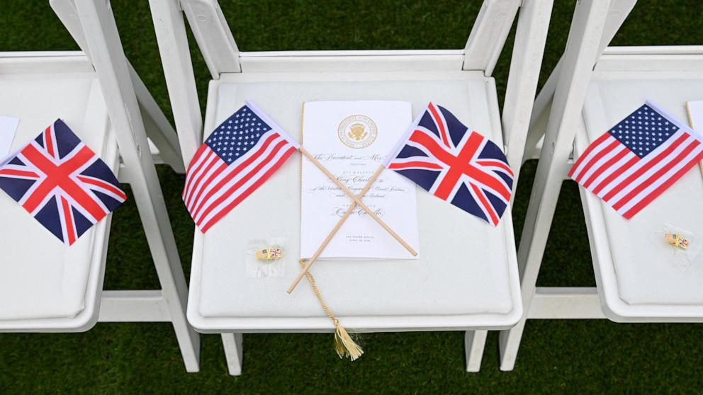 PHOTO: U.S. and British flags, and pins are prepared on a chair ahead of the arrival ceremony at the White House for Britain's King Charles and Queen Camilla amid their state visit to the U.S., in Washington, April 28, 2026. 
