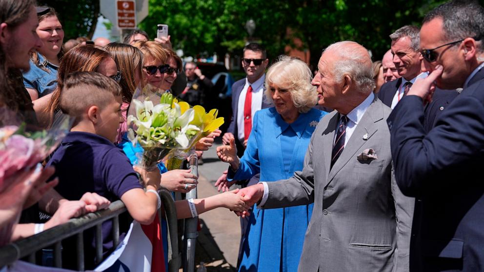 PHOTO: Britain's King Charles III and Queen Camilla greet people during a parade on the final day of their state visit, April 30, 2026 in Front Royal, Va.