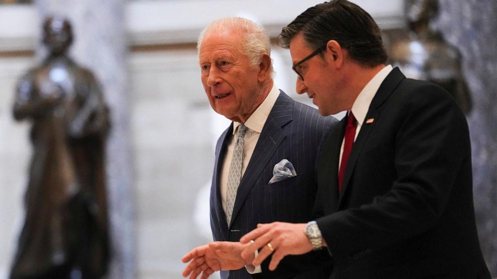 PHOTO: Britain's King Charles and House Speaker Mike Johnson walk through Statuary Hall before a joint meeting of Congress in the House Chamber of the U.S. Capitol in Washington, April 28, 2026. 