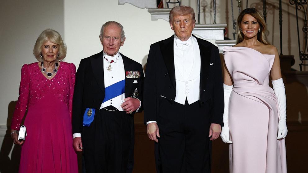 PHOTO: President Donald Trump, first lady Melania Trump, Britain's King Charles and Queen Camila pose in front of the Grand Staircase prior to a state dinner at the White House in Washington, April 28, 2026.