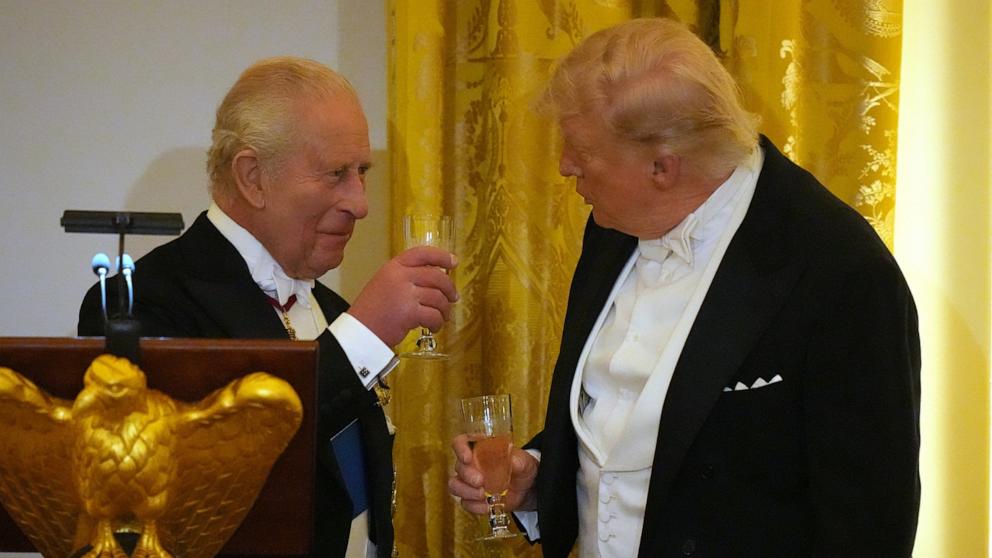 PHOTO: Britain's King Charles III toasts with Britain's King Charles III during a State Dinner with first lady Melania Trump and Queen Camilla in the East Room of the White House State Dinner, April 28, 2026, in Washington. 