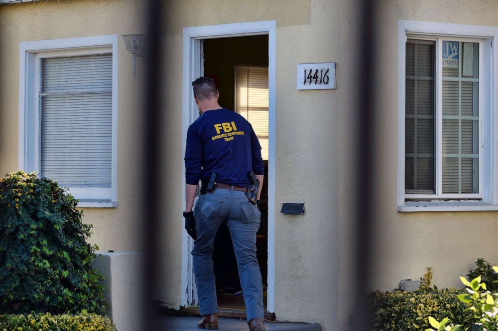 PHOTO: An FBI evidence response team agent enters a building on the grounds of the Kingdom of Jesus Christ Church in the Van Nuys section of Los Angeles, Jan. 29, 2020.