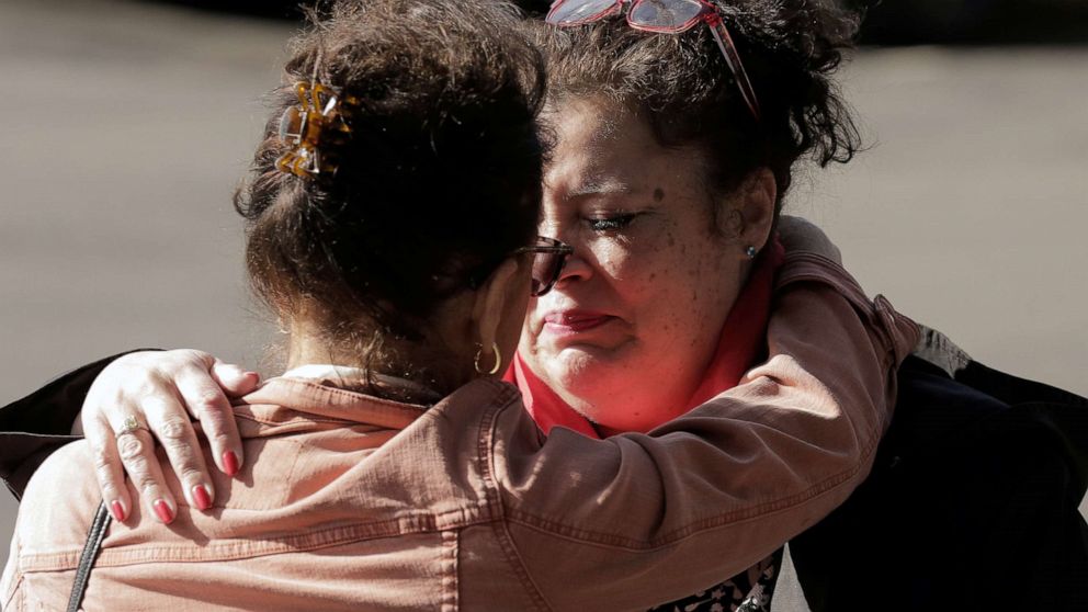 PHOTO: Carmen Gray, left, hugs her sister, Bridget Parkhill, after discussing concerns their mother, a resident at the Life Care Center of Kirkland, which has several confirmed coronavirus cases, in Kirkland, Wash., March 4, 2020.