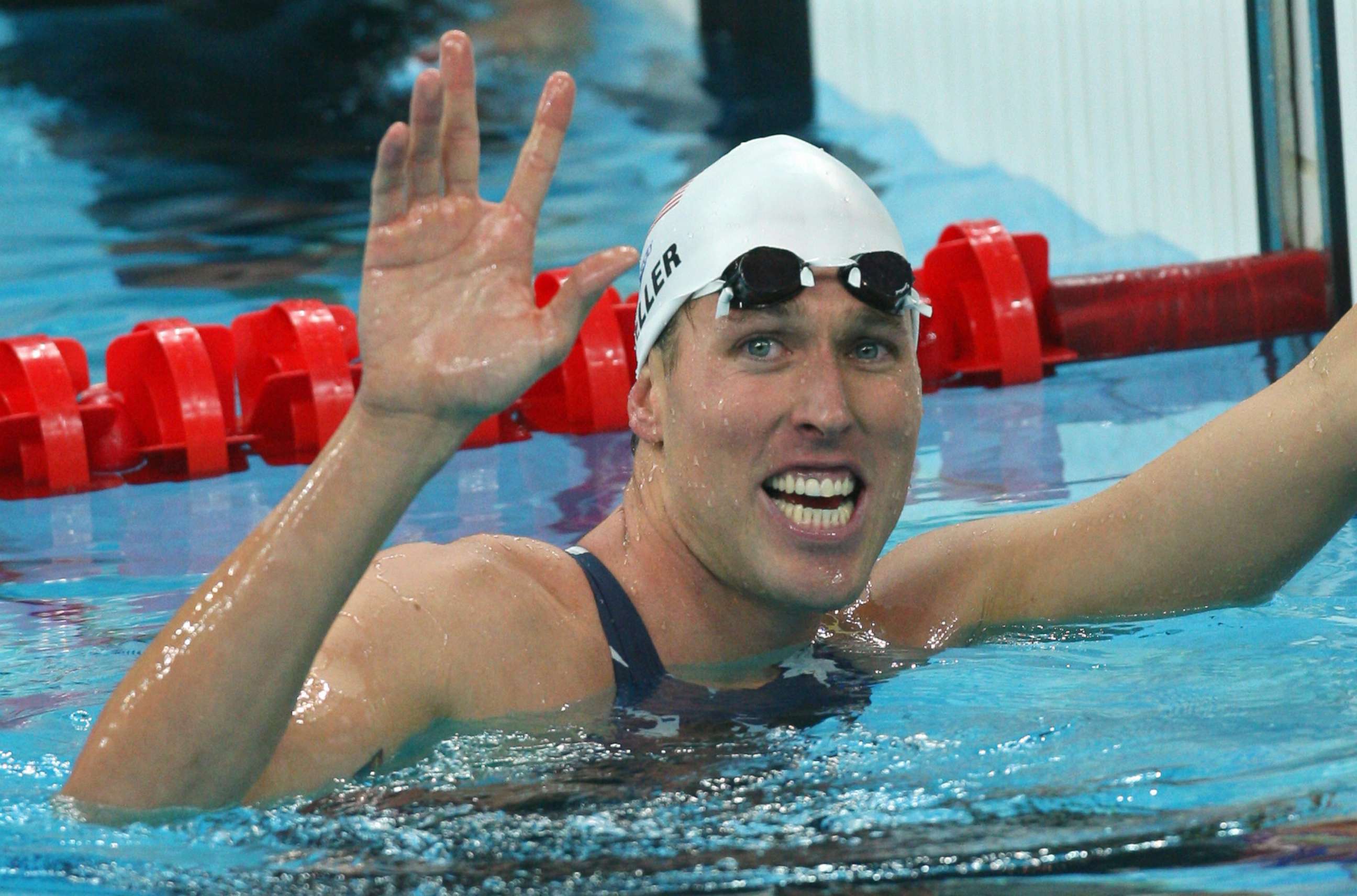 PHOTO: Klete Keller smiles after winning the men's 4 x 200m freestyle relay swimming heat at the National Aquatics Center in the 2008 Beijing Olympic Games on Aug. 12, 2008.