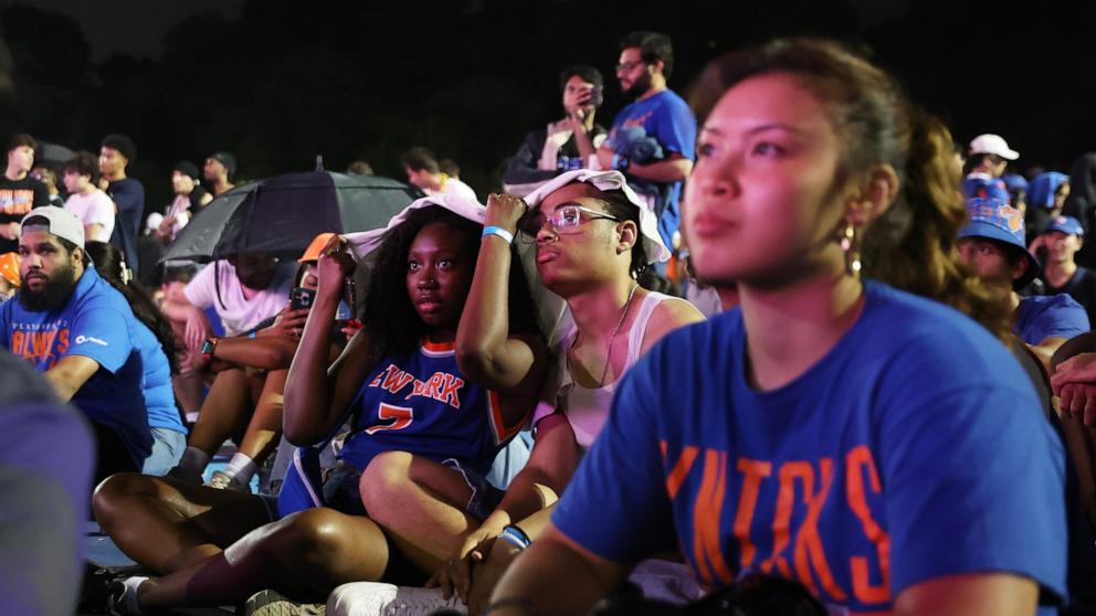 PHOTO: Knicks fans gather for a watch party inside Central Park for Game 4 of the NBA Finals between the New York Knicks and the San Antonio Spurs, June 10, 2026, in New York.