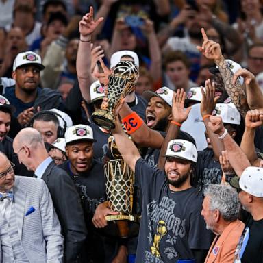 PHOTO: The New York Knicks celebrate with the Larry O'Brien Championship Trophy after defeating the San Antonio Spurs in Game 5 of the NBA Finals basketball series, June 13, 2026, in San Antonio.