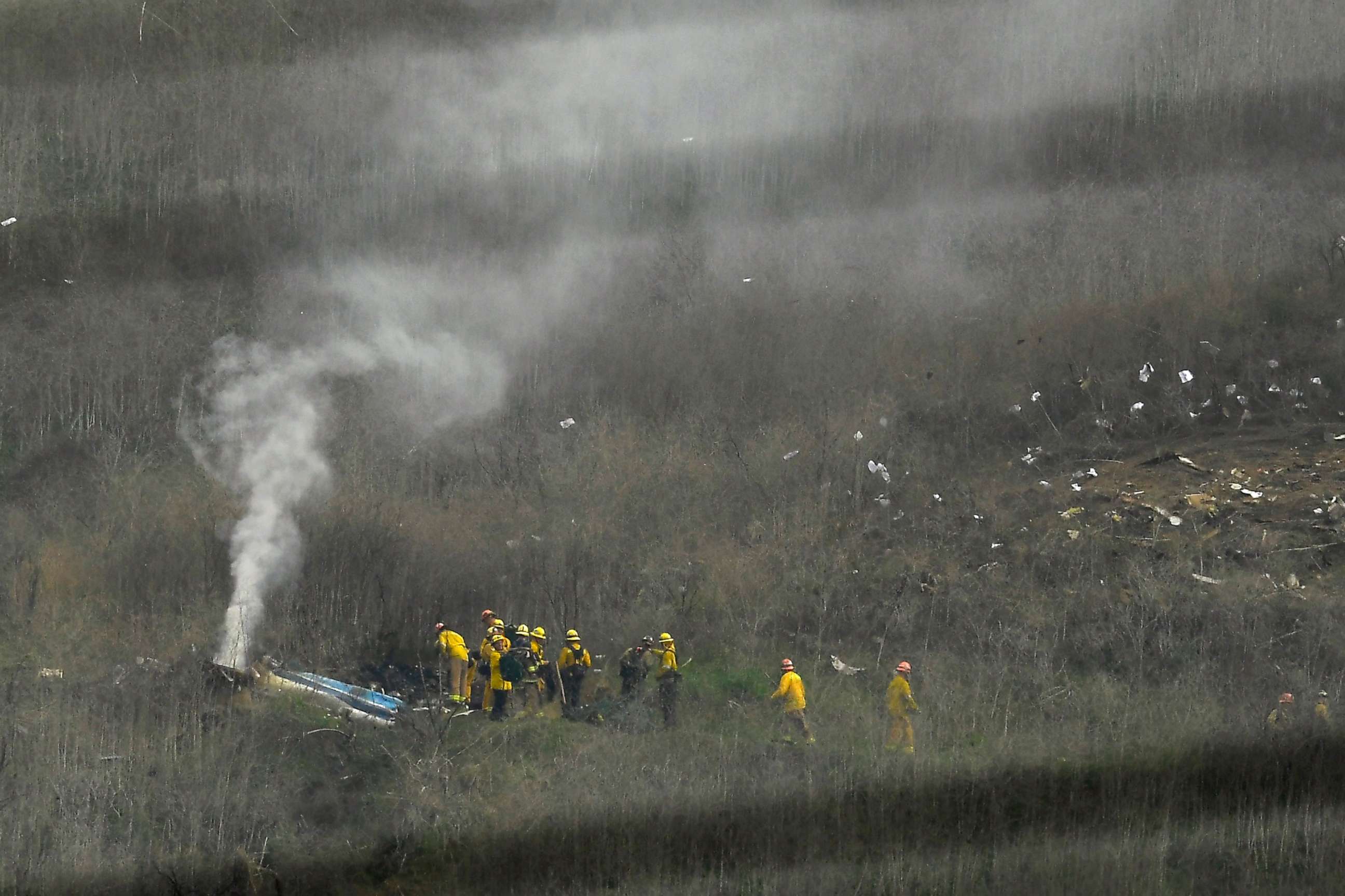 PHOTO: Firefighters work the scene of a helicopter crash that killed former NBA basketball player Kobe Bryant, Jan. 26, 2020, in Calabasas, Calif.