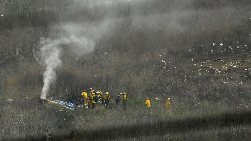 PHOTO: Firefighters work the scene of a helicopter crash that killed former NBA basketball player Kobe Bryant, Jan. 26, 2020, in Calabasas, Calif.