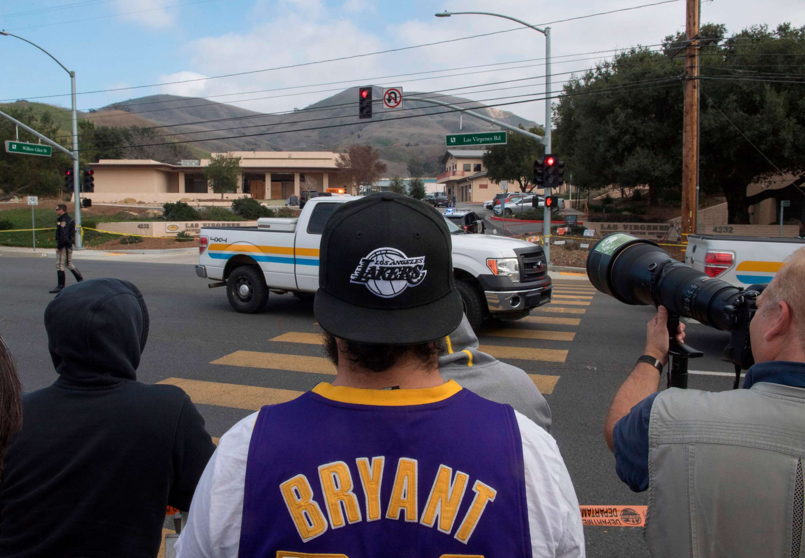 PHOTO: People gather near the scene of a helicopter crash in Calabasas on Sunday, Jan. 26, 2020, that killed nine people, including former Los Angeles Lakers star Kobe Bryant and his daughter, Gianna Maria.