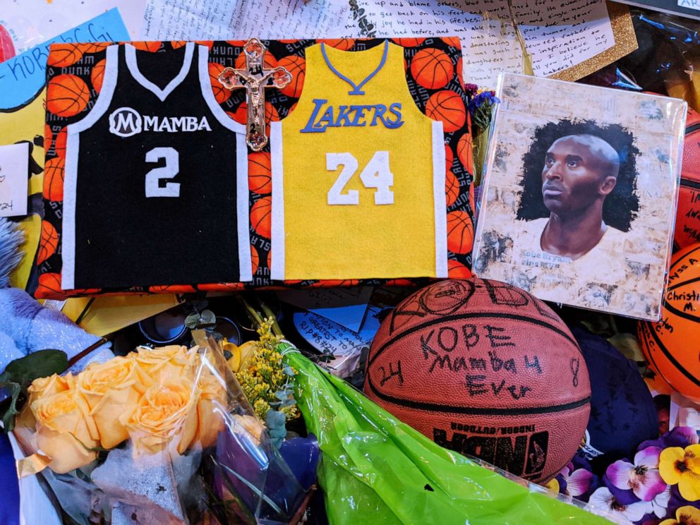 PHOTO: Memorabilia for NBA star Kobe Bryant placed at a memorial for Bryant by fans paying their respect near Staples Center in Los Angeles, Feb. 2, 2020.