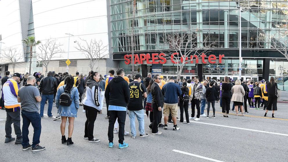 PHOTO: Fans arrive outside prior to The Celebration of Life for Kobe & Gianna Bryant at Staples Center on Feb. 24, 2020, in Los Angeles.