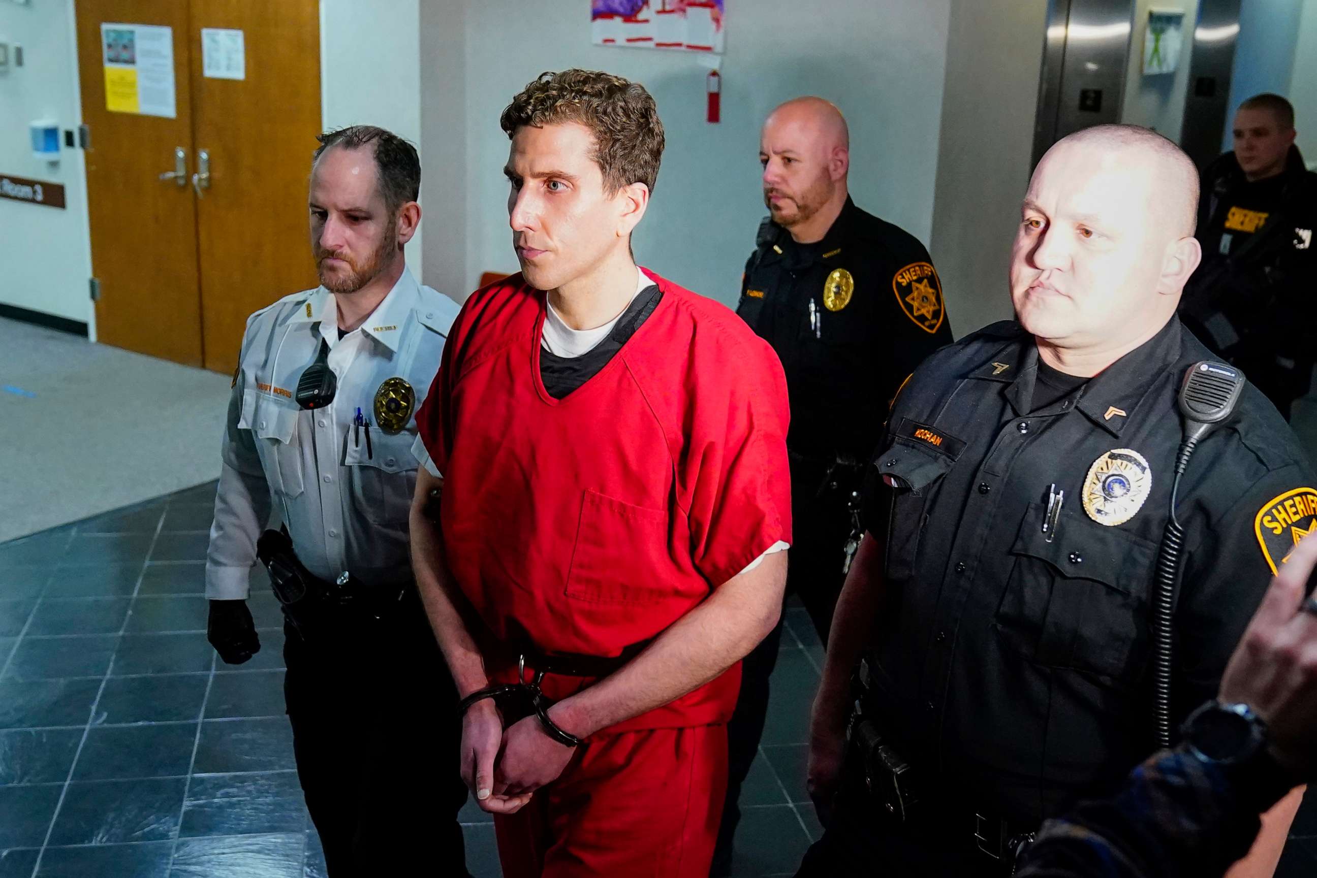 PHOTO: Bryan Kohberger, who is accused of killing four University of Idaho students, is escorted to an extradition hearing at the Monroe County Courthouse in Stroudsburg, Pa., Tuesday, Jan. 3, 2023.