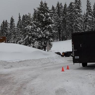 Officials said search and rescue crews recovered the bodies of two people who died after being buried in an avalanche.