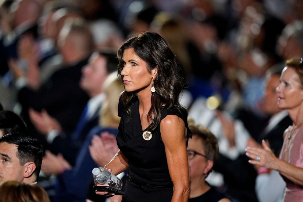 PHOTO: South Dakota Gov. Kristi Noem stands in the crowd on the South Lawn of the White House during the fourth day of the Republican National Convention in Washington, Aug. 27, 2020.