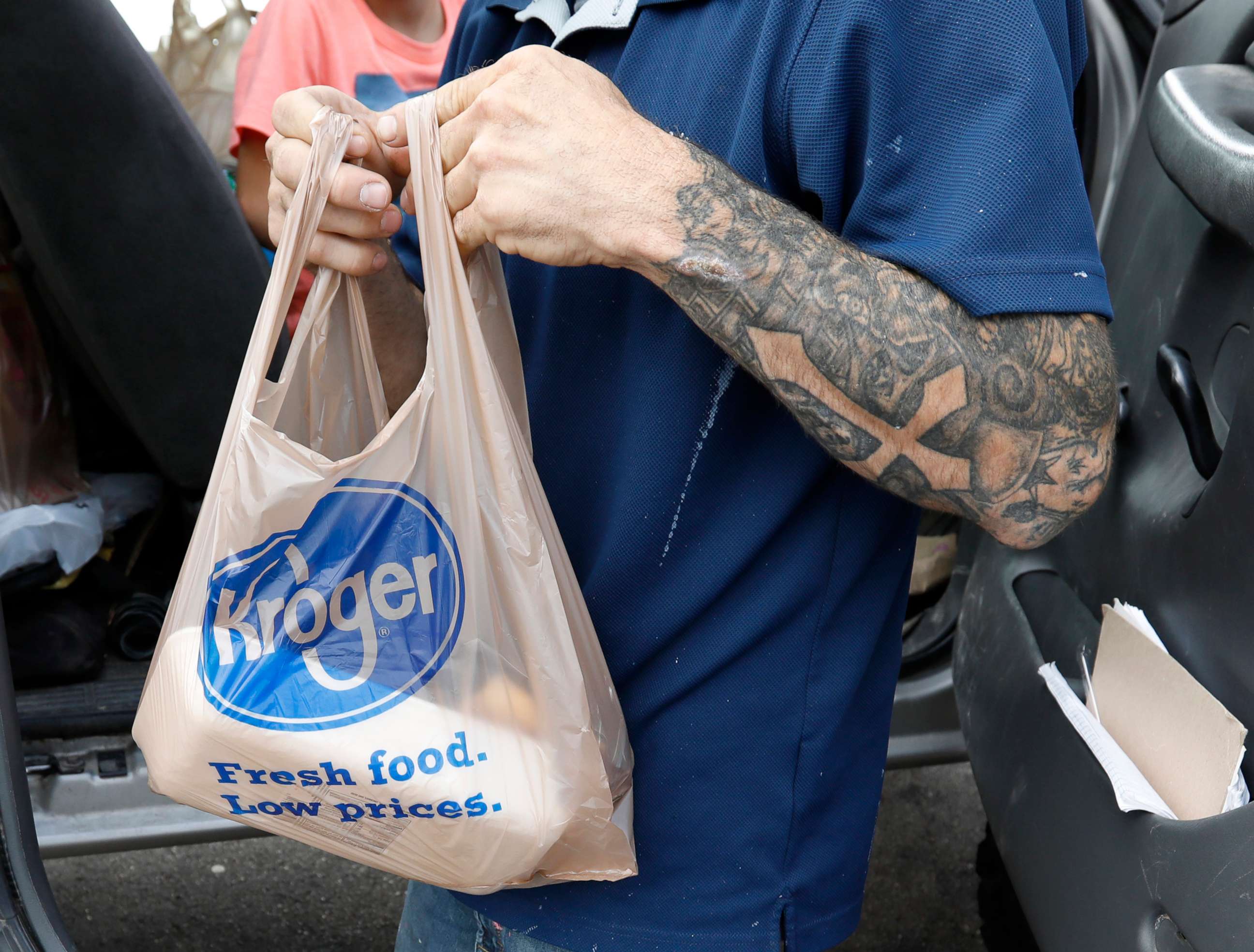 PHOTO: A customer removes his purchases at a Kroger grocery store in Flowood, Miss., June 26, 2019. 