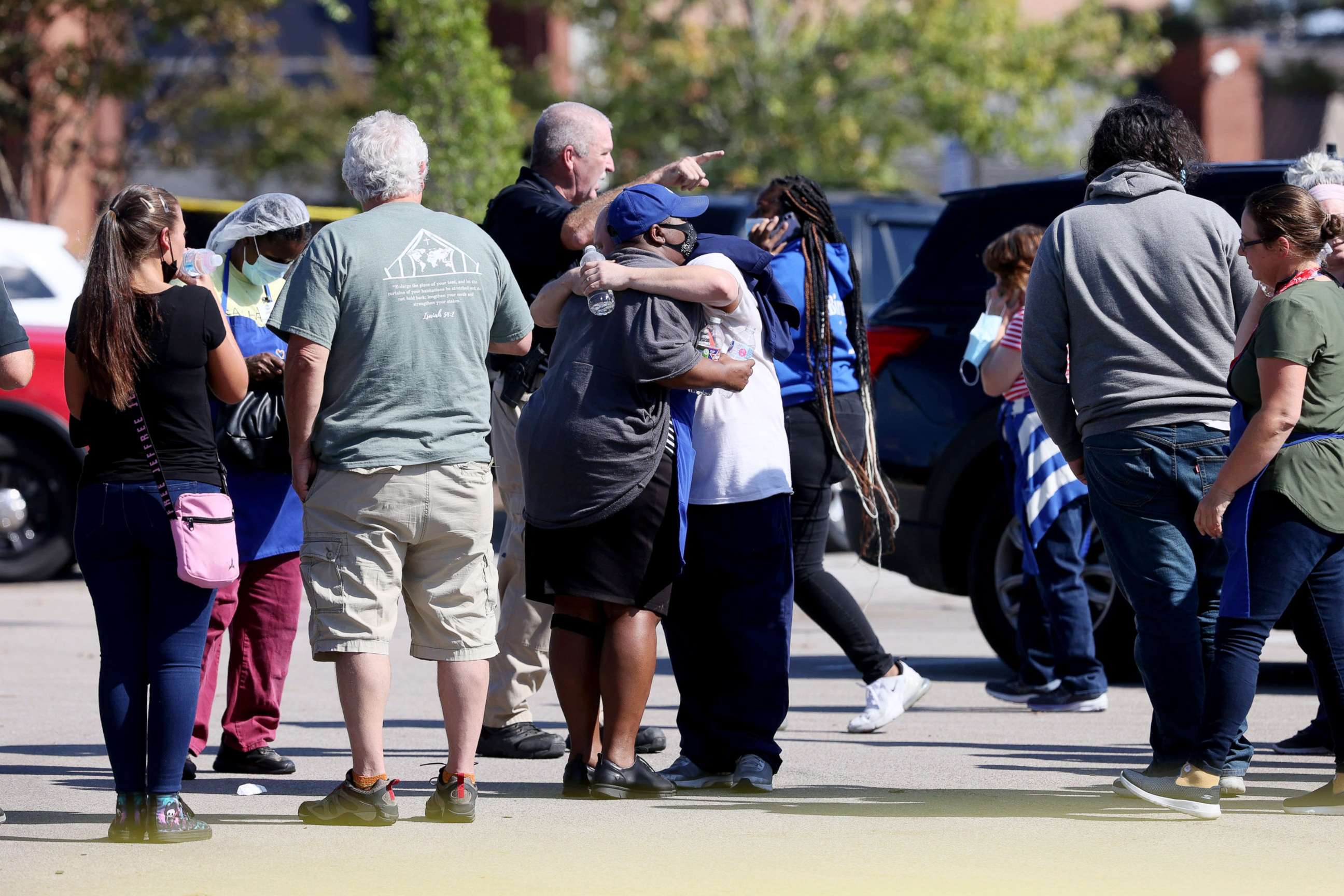 PHOTO: A crowd gathers outside the Kroger on New Byhalia Road where a shooting took place in Collierville, Tenn., Sept. 23, 2021.