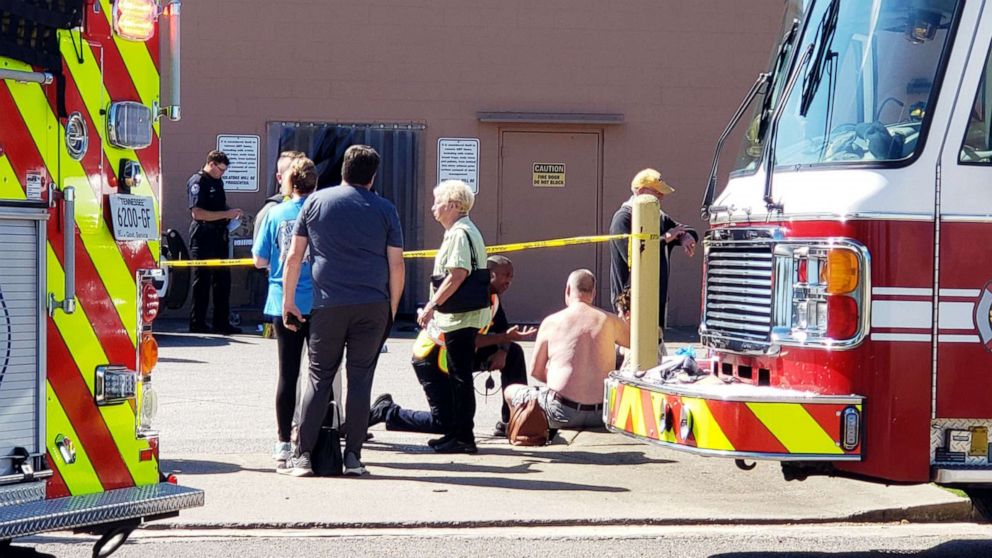 PHOTO: First responders gather outside the Kroger on New Byhalia Road where a shooting took place in Collierville, Tenn., Sept. 23, 2021.