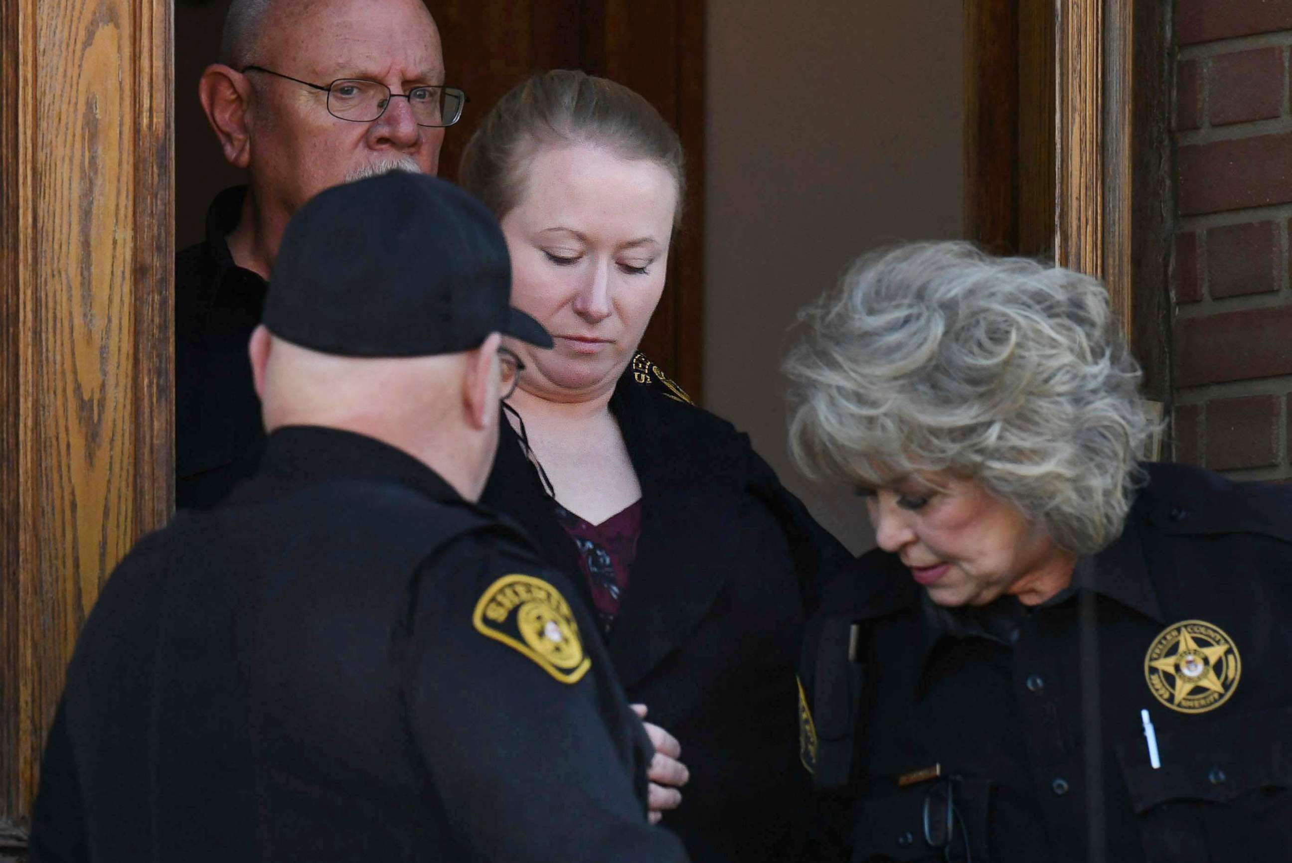 PHOTO: Krystal Lee is lead to a van by representatives of the Teller County Sheriff's Dept. after being sentenced at the Teller County Courthouse in Cripple Creek, Colo., on Jan. 28, 2020.