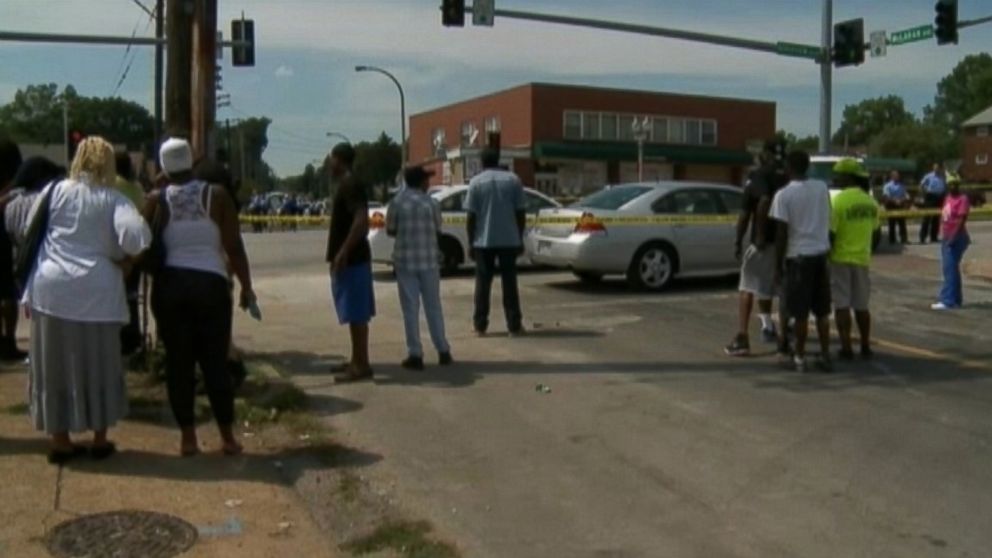 PHOTO: Police in St. Louis respond to an officer-involved shooting that left a 23-year-old man dead today.