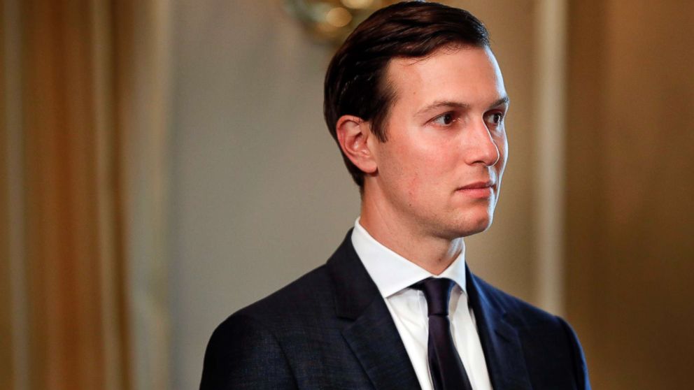 In this Friday, Aug. 11, 2017 file photo, White House senior adviser Jared Kushner listens to President Donald Trump at Trump National Golf Club in Bedminster, N.J.