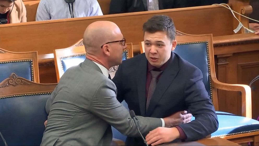 PHOTO: Kyle Rittenhouse and his lawyer react as he was acquitted of all charges at the Kenosha County Courthouse in Kenosha, Wis., on Nov. 19, 2021.
