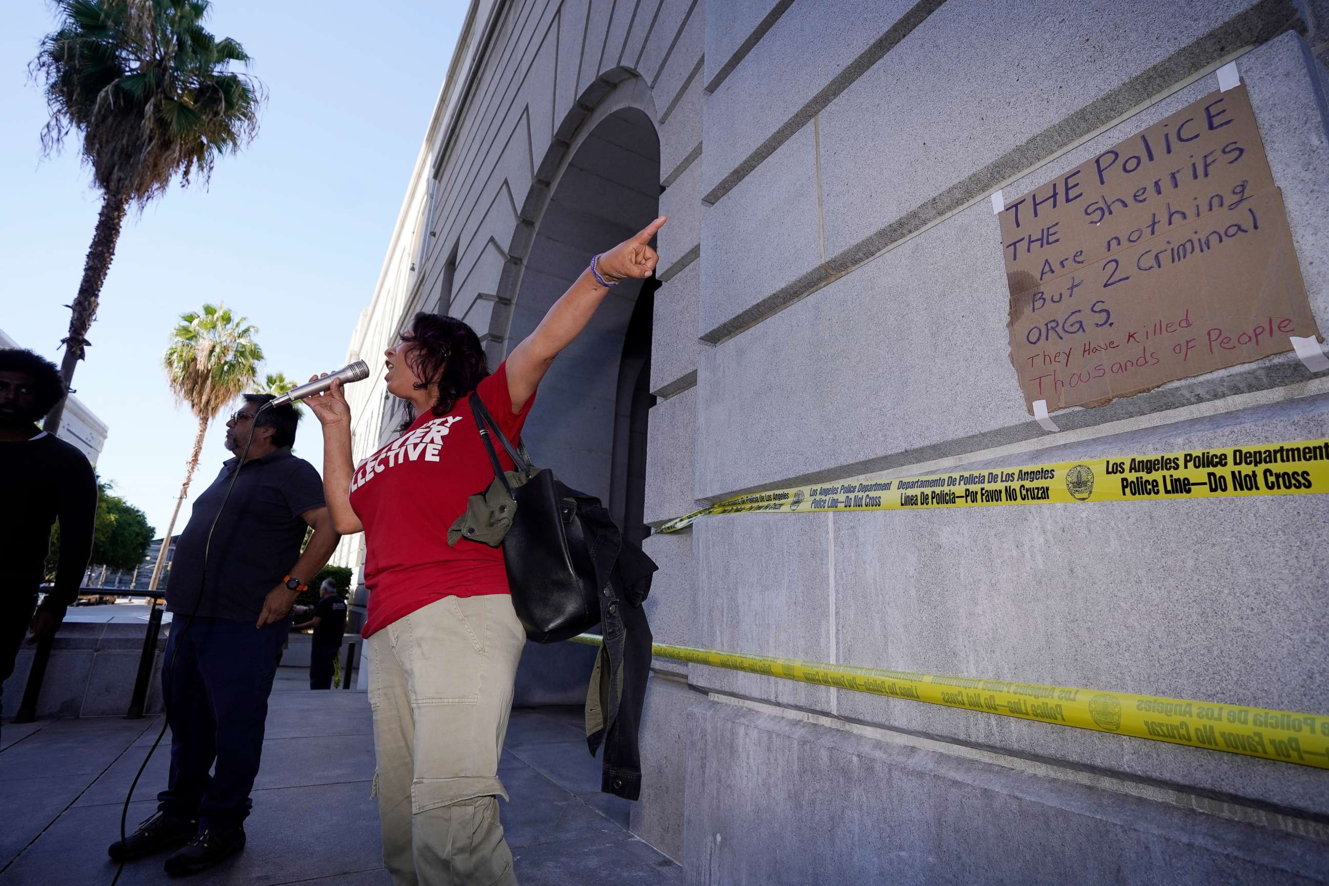 PHOTO: Citizens protest at the entrance of Los Angeles City Hall, Oct. 19, 2022, in Los Angeles.