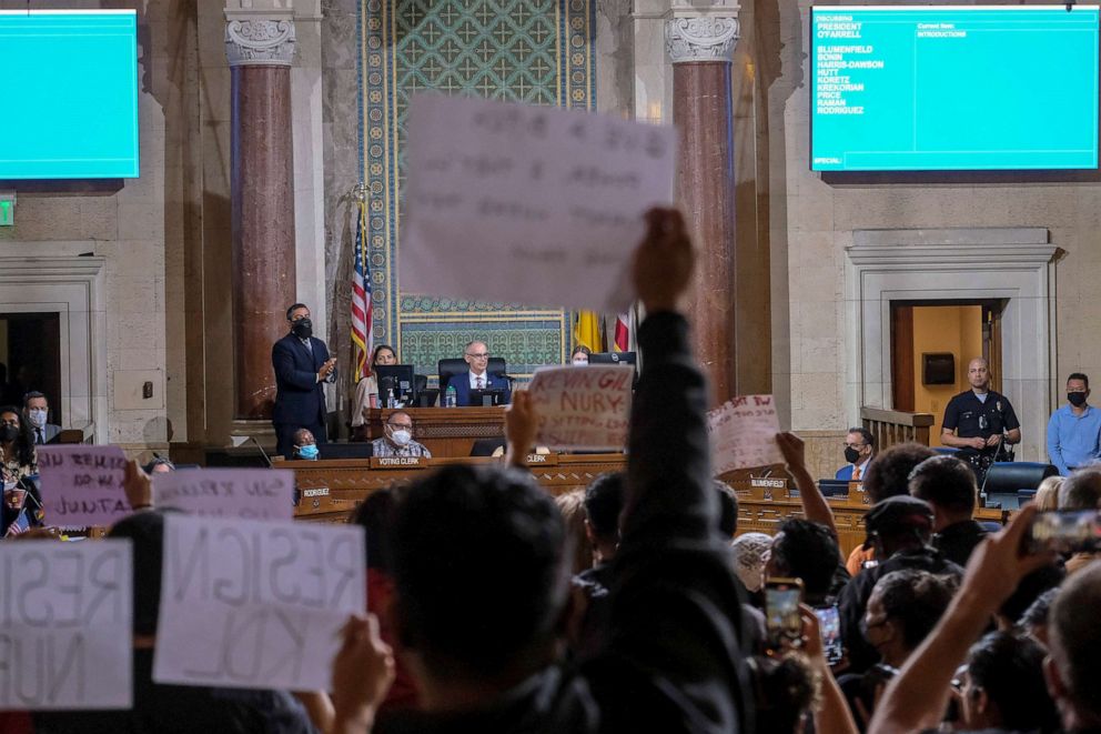 PHOTO: Interim Los Angeles City Council President Mitch O'Farrell, rear center, speaks before the cancellation of the Los Angeles City Council meeting Wednesday, Oct. 12, 2022, in Los Angeles. 