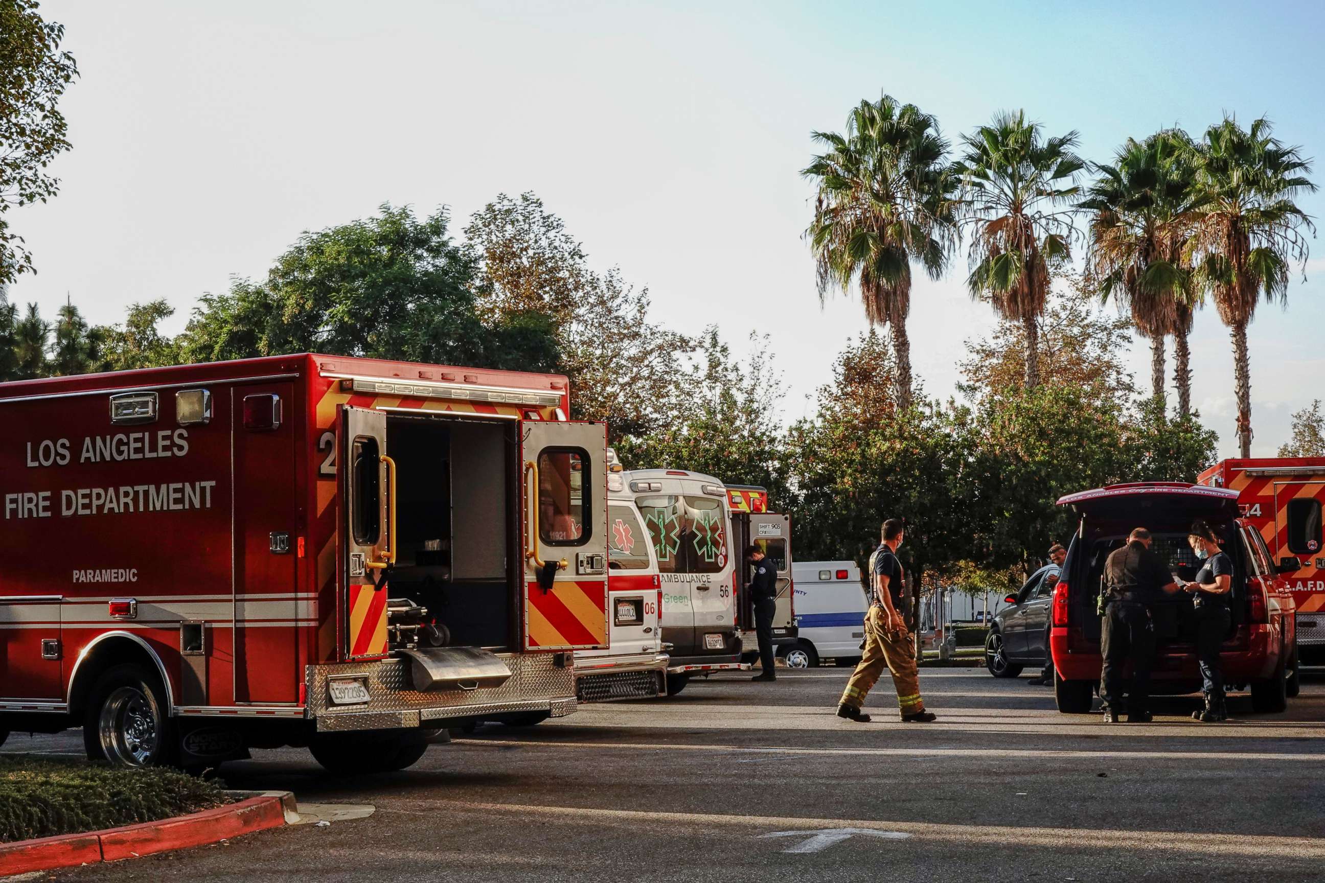 PHOTO: Firefighters and paramedics wait outside LAC + USC Medical Center during a surge of coronavirus disease (COVID-19) cases in Los Angeles, California, U.S., December 27, 2020.  