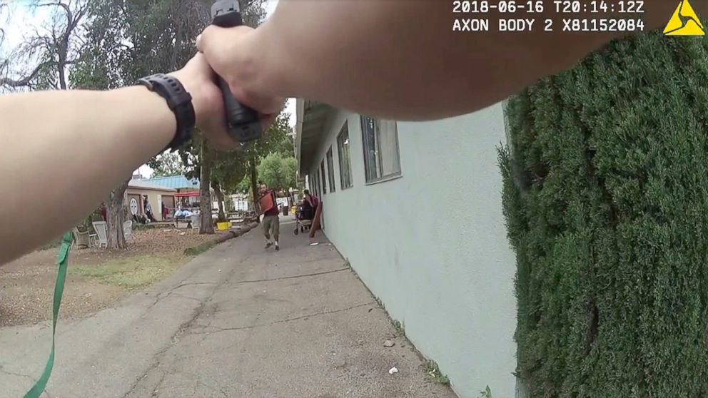 This still image taken from a body camera video released by the Los Angeles Police Department shows a Los Angeles Police Officer confronting an armed suspect in the Van Nuys neighborhood of Los Angeles on June 16, 2018.