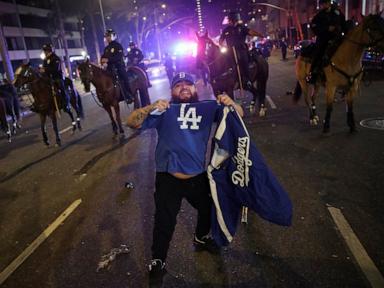 Cops clash with 'hostile' fans in Los Angeles after Dodgers win World Series