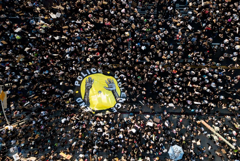 PHOTO: Demonstrators take part in a protest, June 3, 2020, in downtown Los Angeles, sparked by the death of George Floyd, who died May 25 after he was restrained by Minneapolis police.