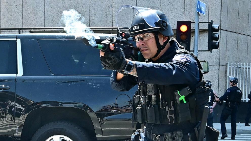 PHOTO: Law enforcement clashes with demonstrators outside the Metropolitan Detention Center, MDC, in downtown Los Angeles, June 8, 2025.