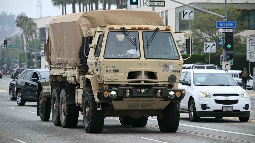 PHOTO: A California National Guard vehicle drives down a street in downtown Los Angeles, June 9, 2025.