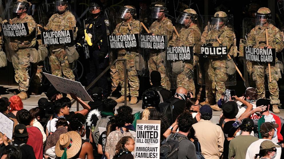 PHOTO: Members of the California National Guard stand guard in front of the Edward R. Roybal Federal Building in Los Angeles, June 9, 2025.