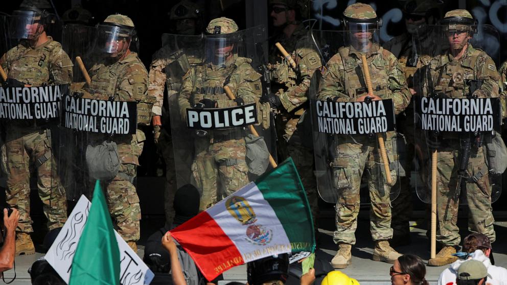 PHOTO: Members of the California National Guard stand guard in front of the Edward R. Roybal Federal Building in Los Angeles, June 9, 2025.