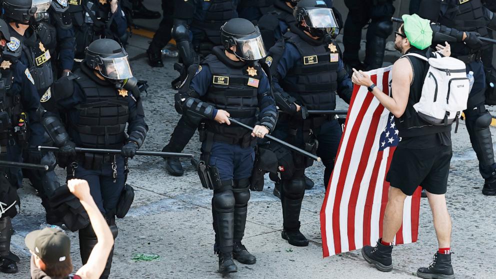 PHOTO: California Highway Patrol officers clear protestors who were blocking the 101 freeway on June 08, 2025 in Los Angeles.
