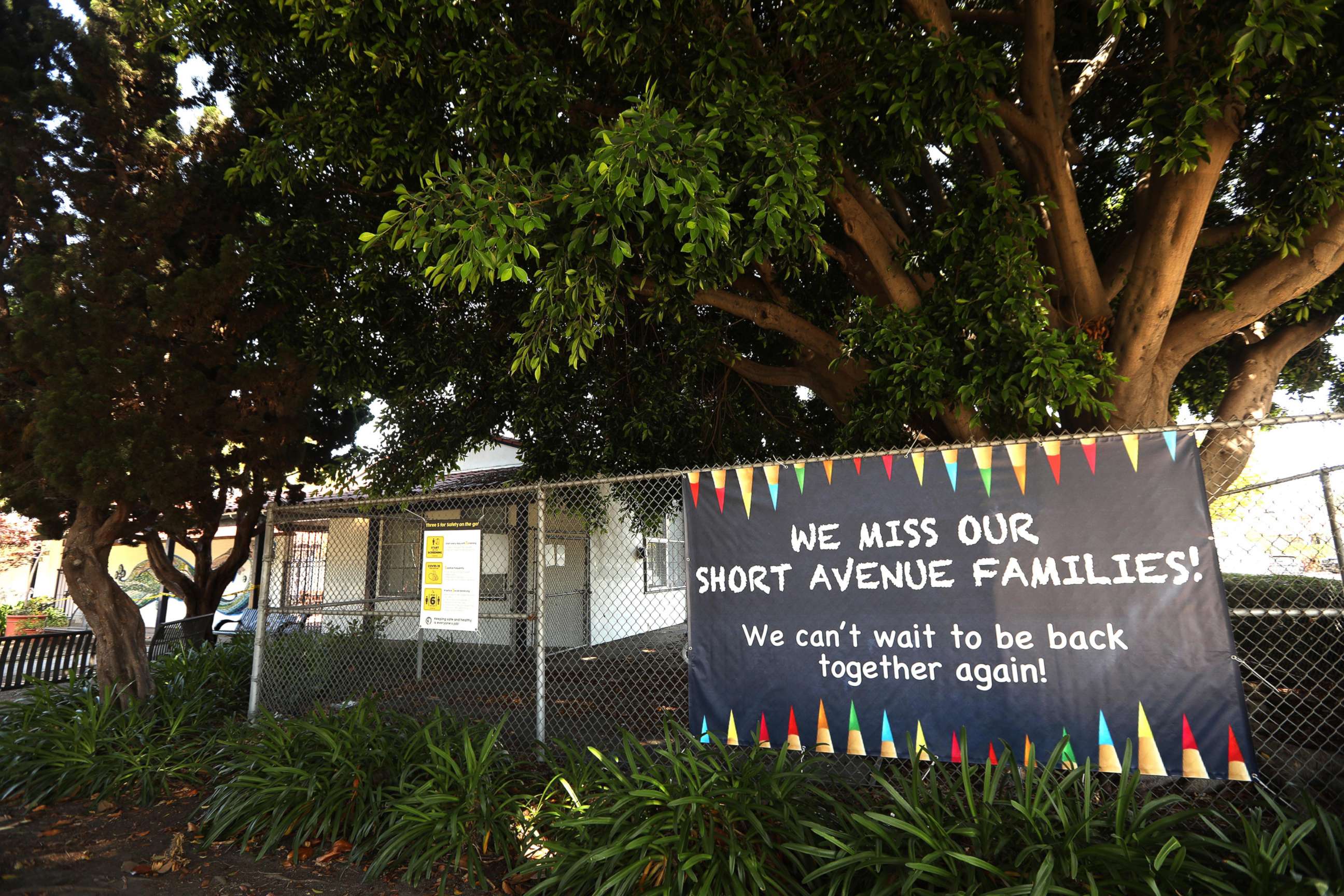 PHOTO: A sign states, "We miss our Short Avenue Families," at the closed Short Avenue Elementary School in Mar Vista, Calif., on July 13, 2020.