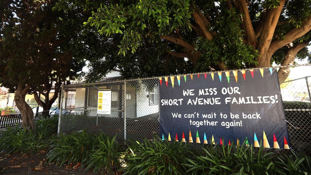 PHOTO: A sign states, "We miss our Short Avenue Families," at the closed Short Avenue Elementary School in Mar Vista, Calif., on July 13, 2020.