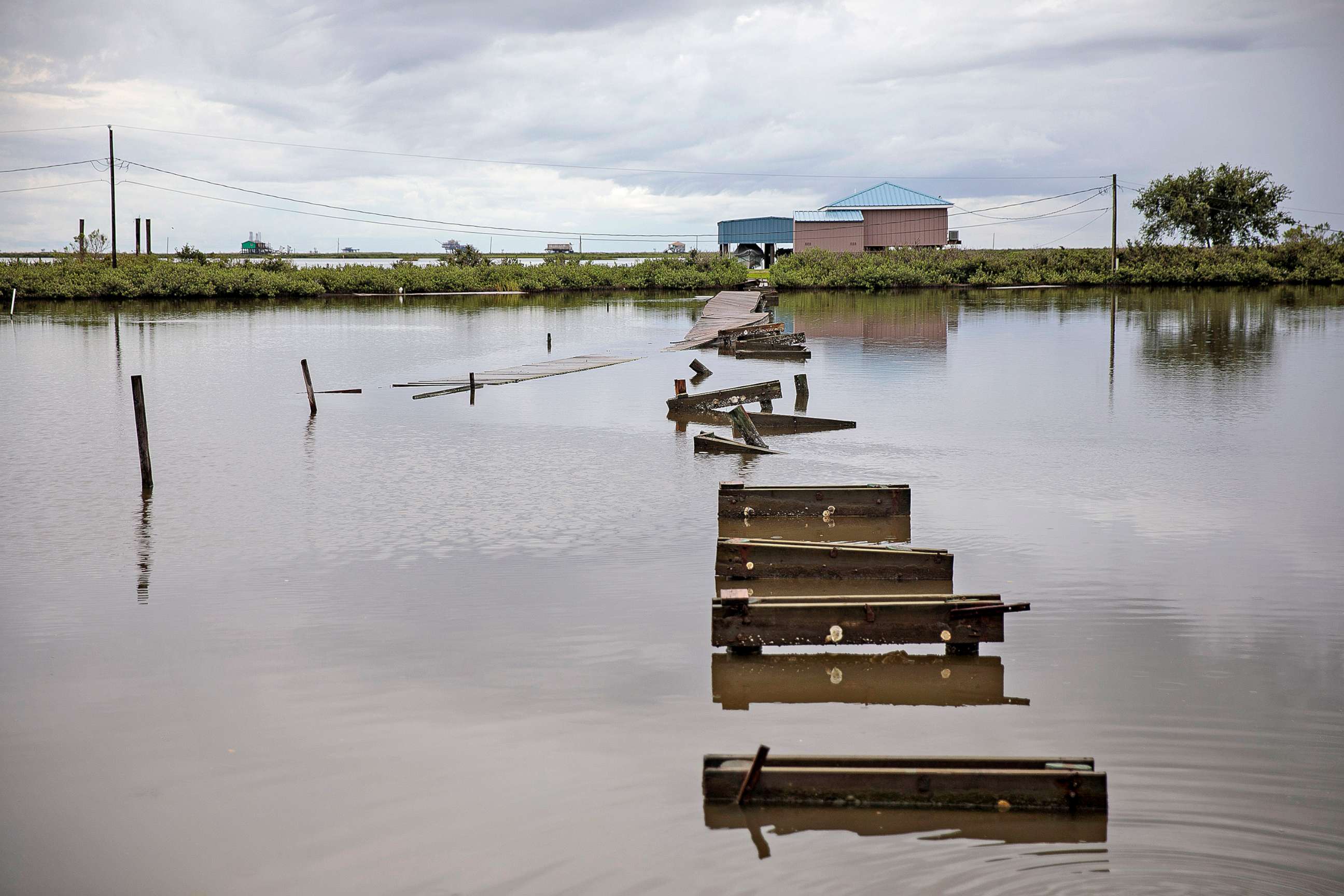 PHOTO: A home is pictured amidst coastal waters and marshlands on Aug. 25, 2019 in Port Fourchon, La. According NOAA, Louisiana's combination of rising waters and sinking land give it one of the highest rates of relative sea level rise on the planet.